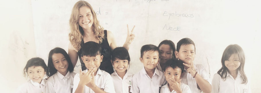 Corinna with school kids in Indonesia