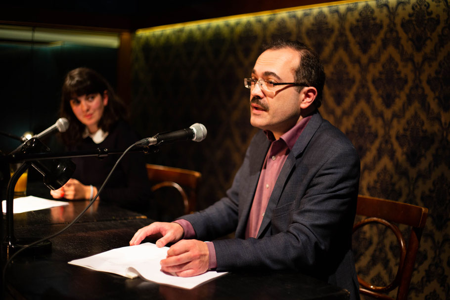 Dmitri Dragilew reading his work and Nefeli Kavouras reading the translation