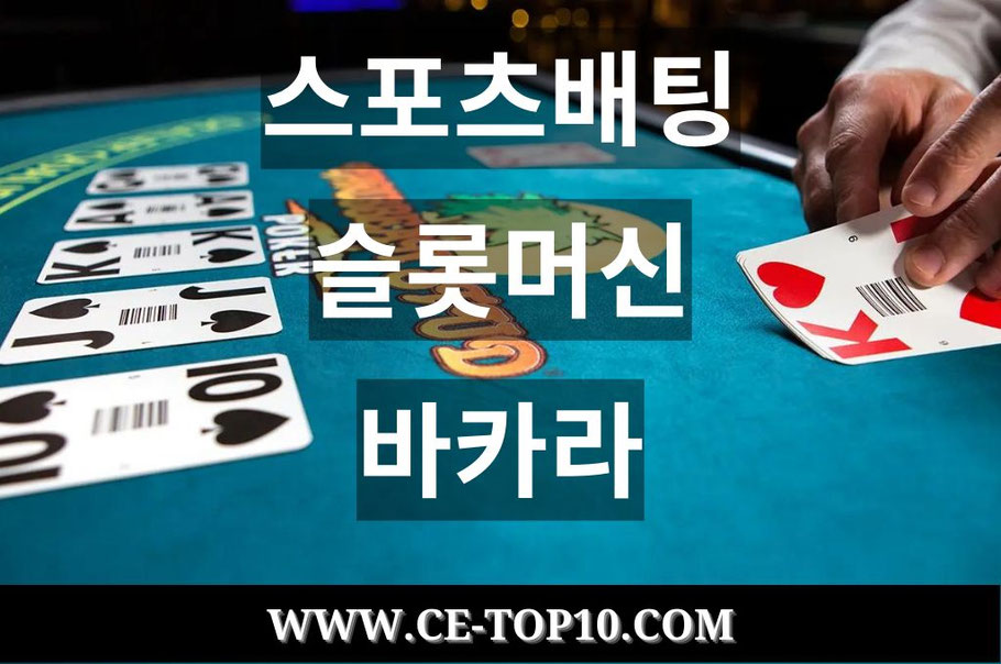 Dealer's hand places the cards at the blue caribbean stud poker table.