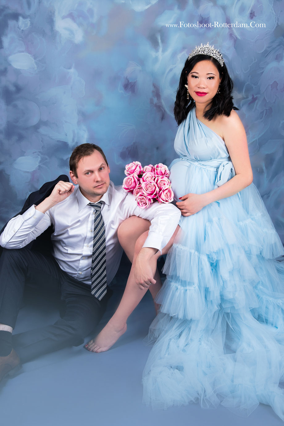 pregnancy shoot with roses and partner