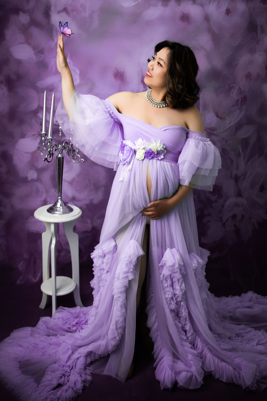 very exclusive purple scenery for pregnancy shoot