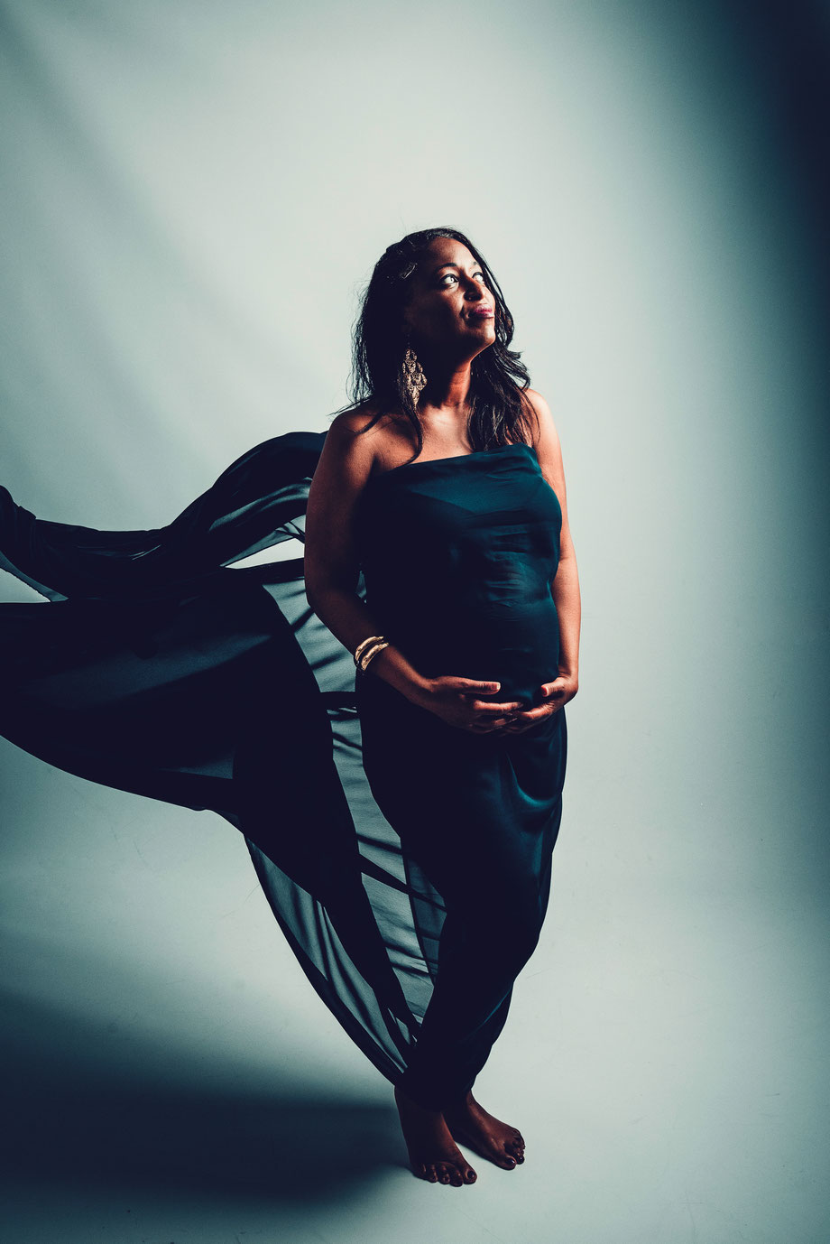 pregnant woman in dark scenery