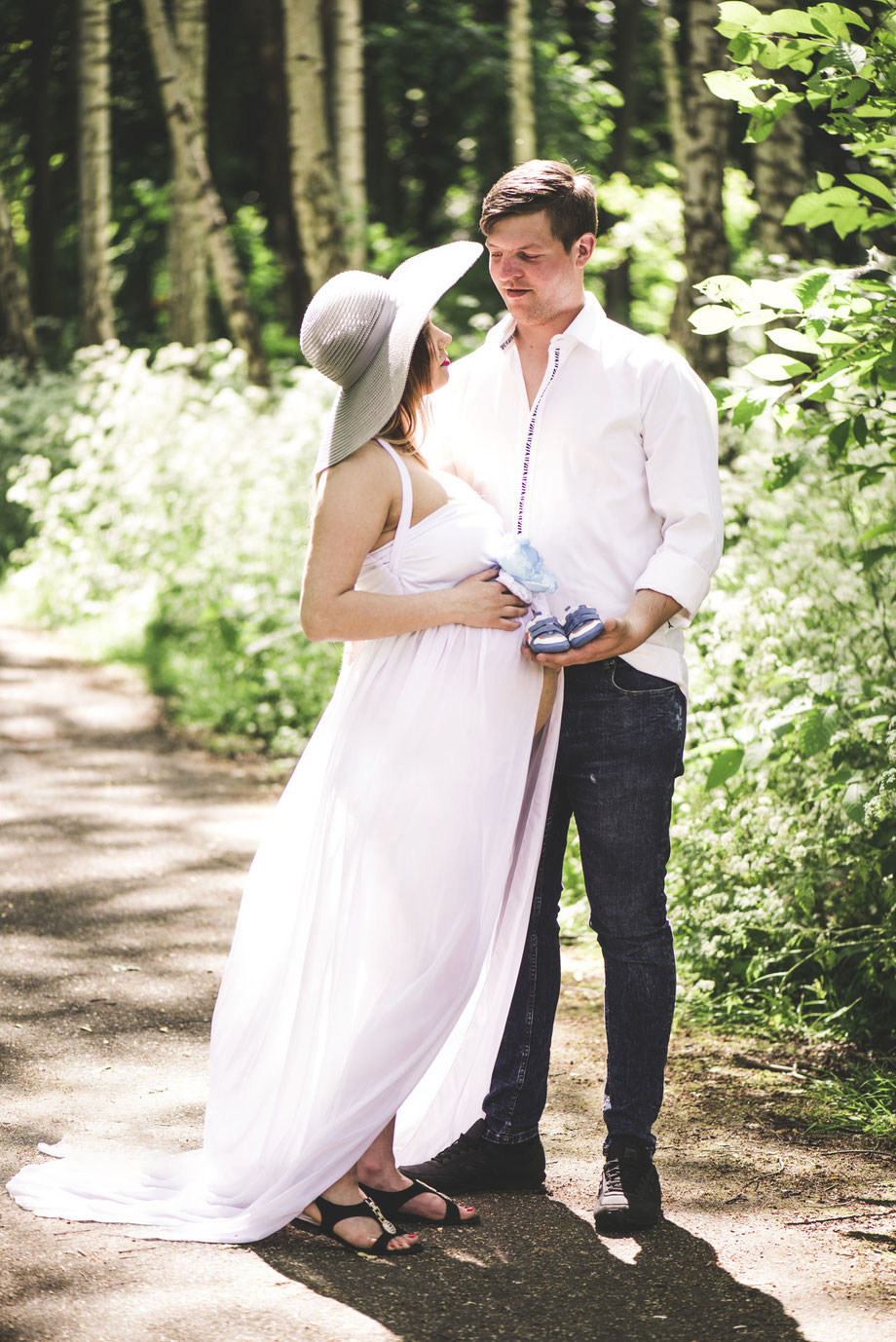 white maternity dress with partner