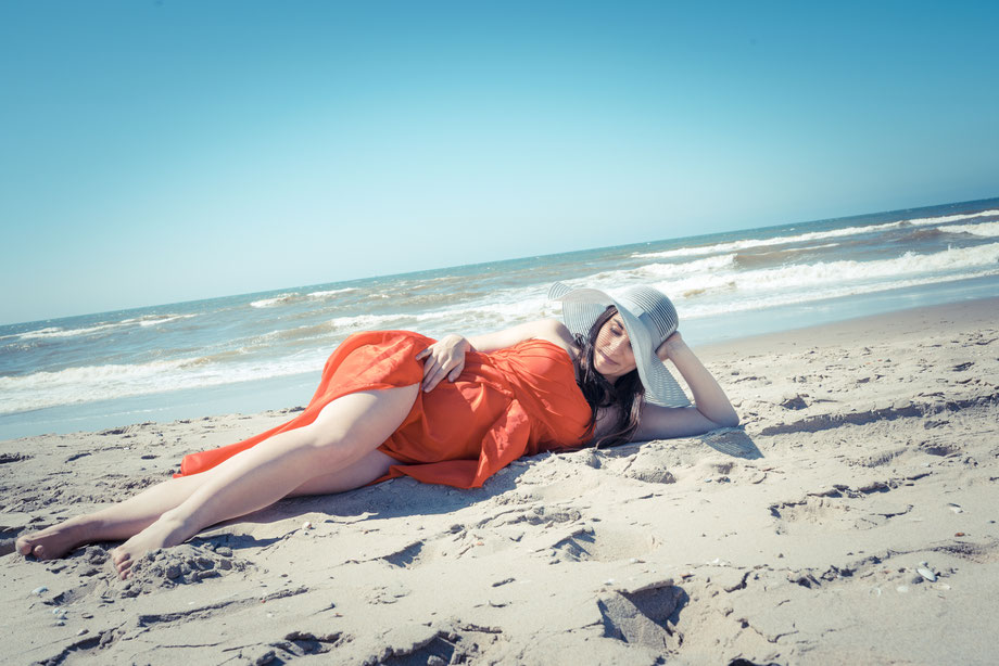 pregnant woman in summer scenery