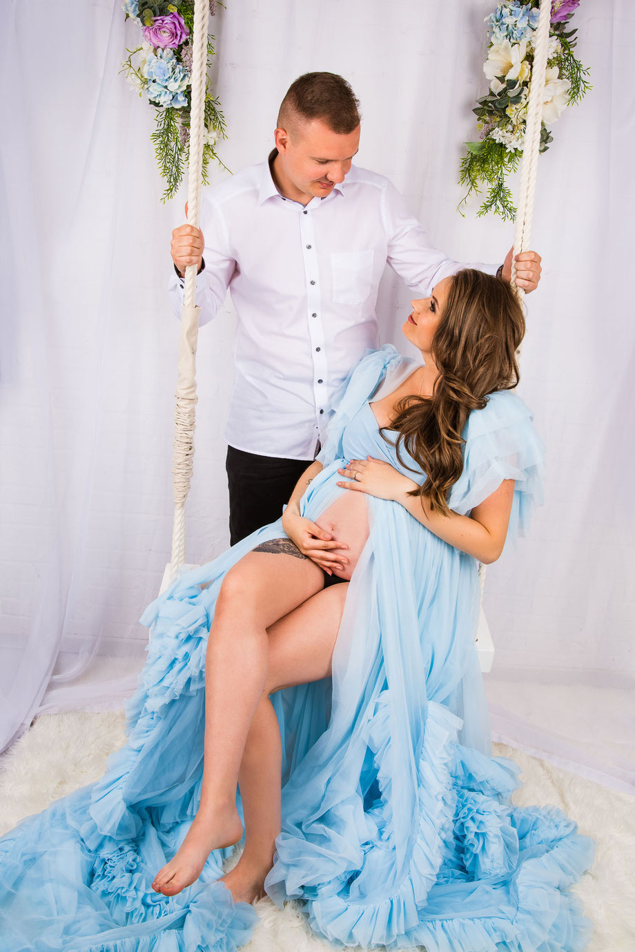 blue maternity dress on swing
