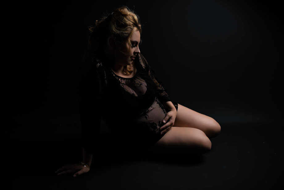 pregnant lady in dark scenery