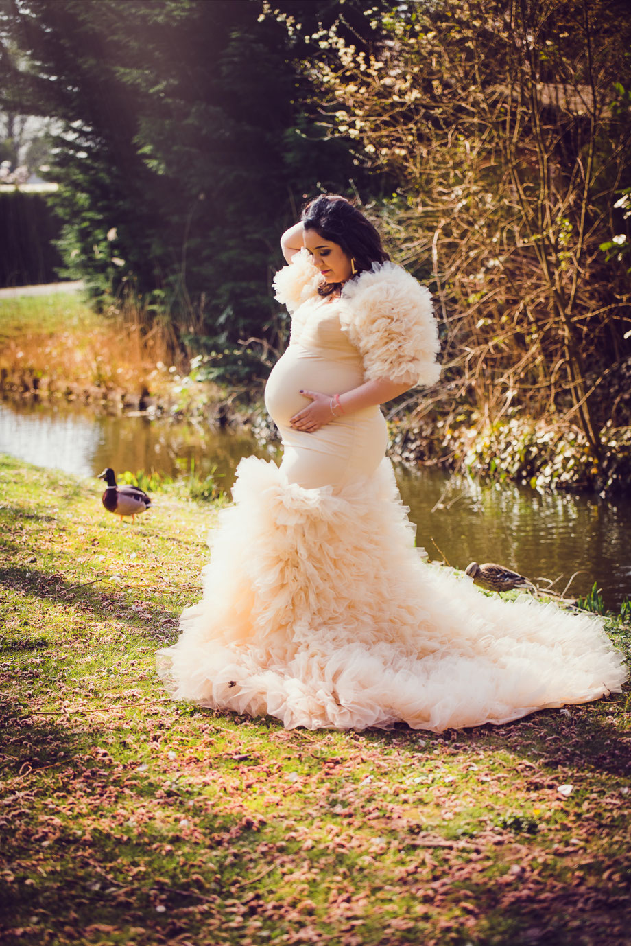 pregnancy shoot in elegant white dress