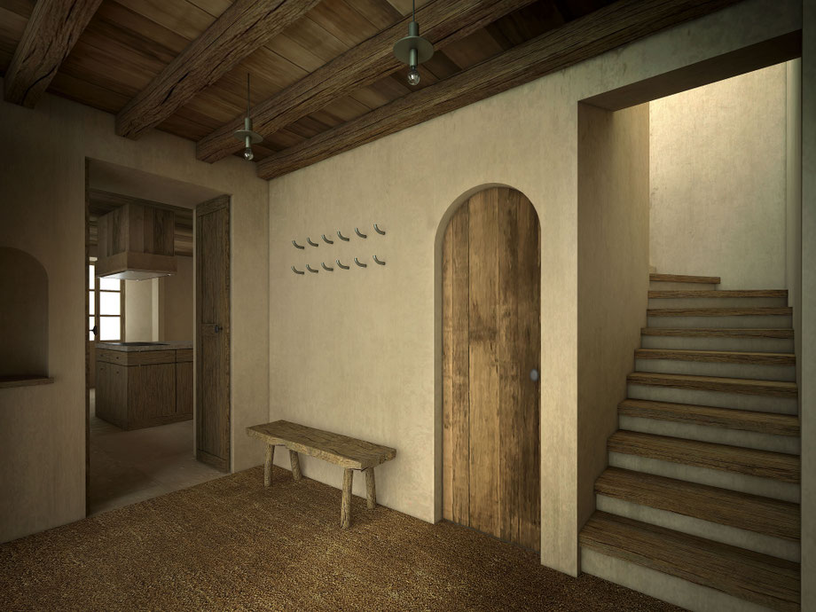 Rénovation d'un chalet dans les Alpes. L'entrée, porte de communication cintrée.