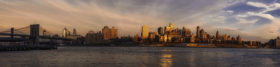 "GOLDEN LIGHTS OVER BROOKLYN".    Pano in New York City at sunset.