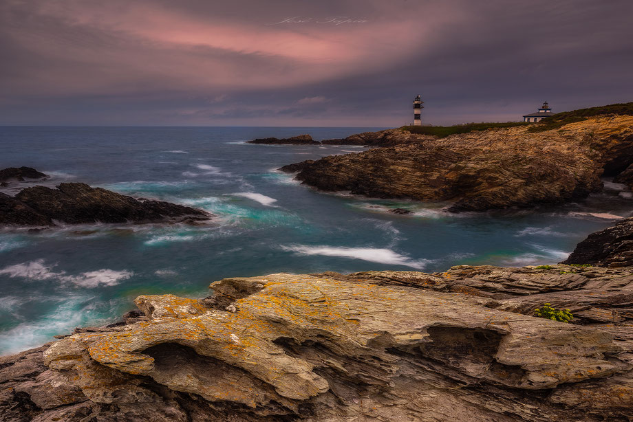 "LUCKY MAN".    Gorgeus place in Galicia coast at sunset, Spain.