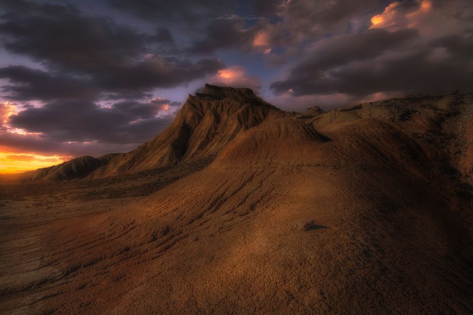              "PLANET SAND". A corner in Bardenas Reales NP at sunset, Navarra, Spain. 