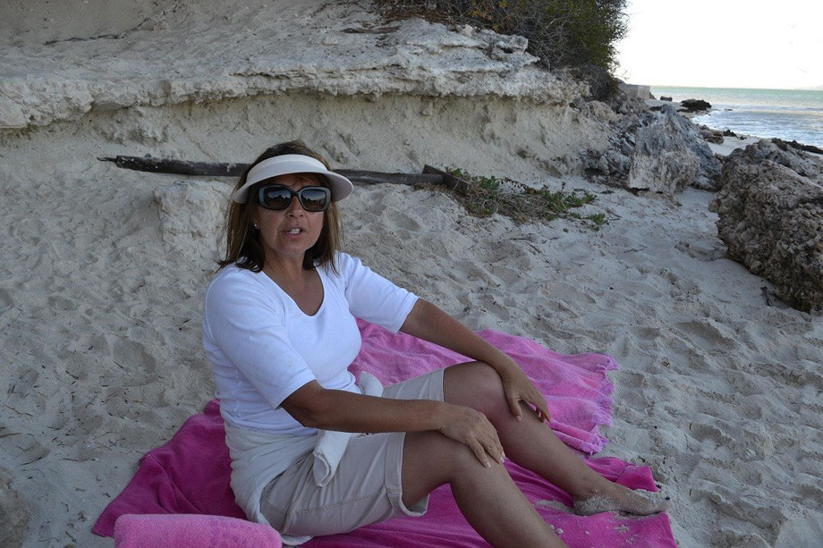 Claire in our sheltered cave on the beach