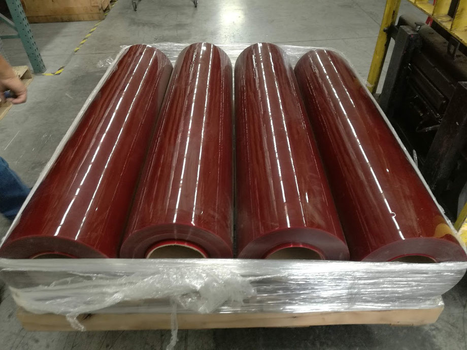 Rollos de Cortina roja transparente para áreas de soldadura.