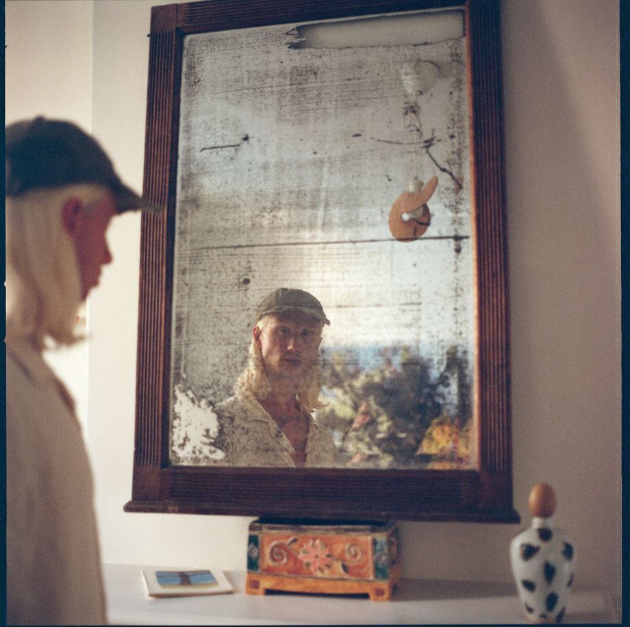 Portrait of Émile Kirsch captured in soft natural daylight on analog film 
