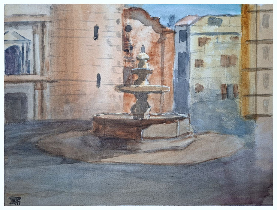 Fuente central de piedra en la plaza de Chelva, rodeada de edificios históricos bajo luz cálida.
