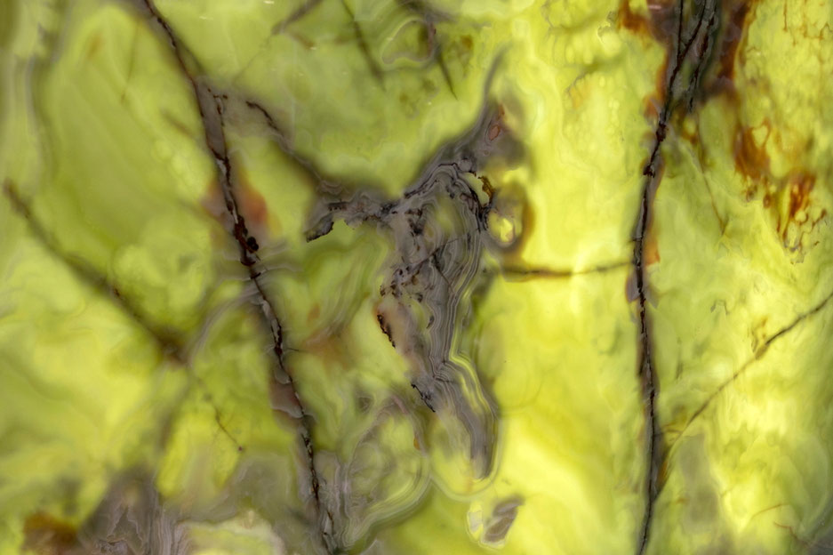 Green onyx slab backlit by sun