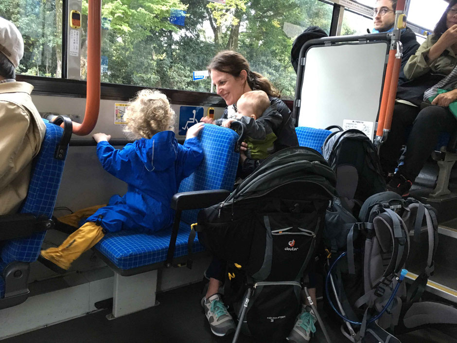 backpack carriers on bus in Japan
