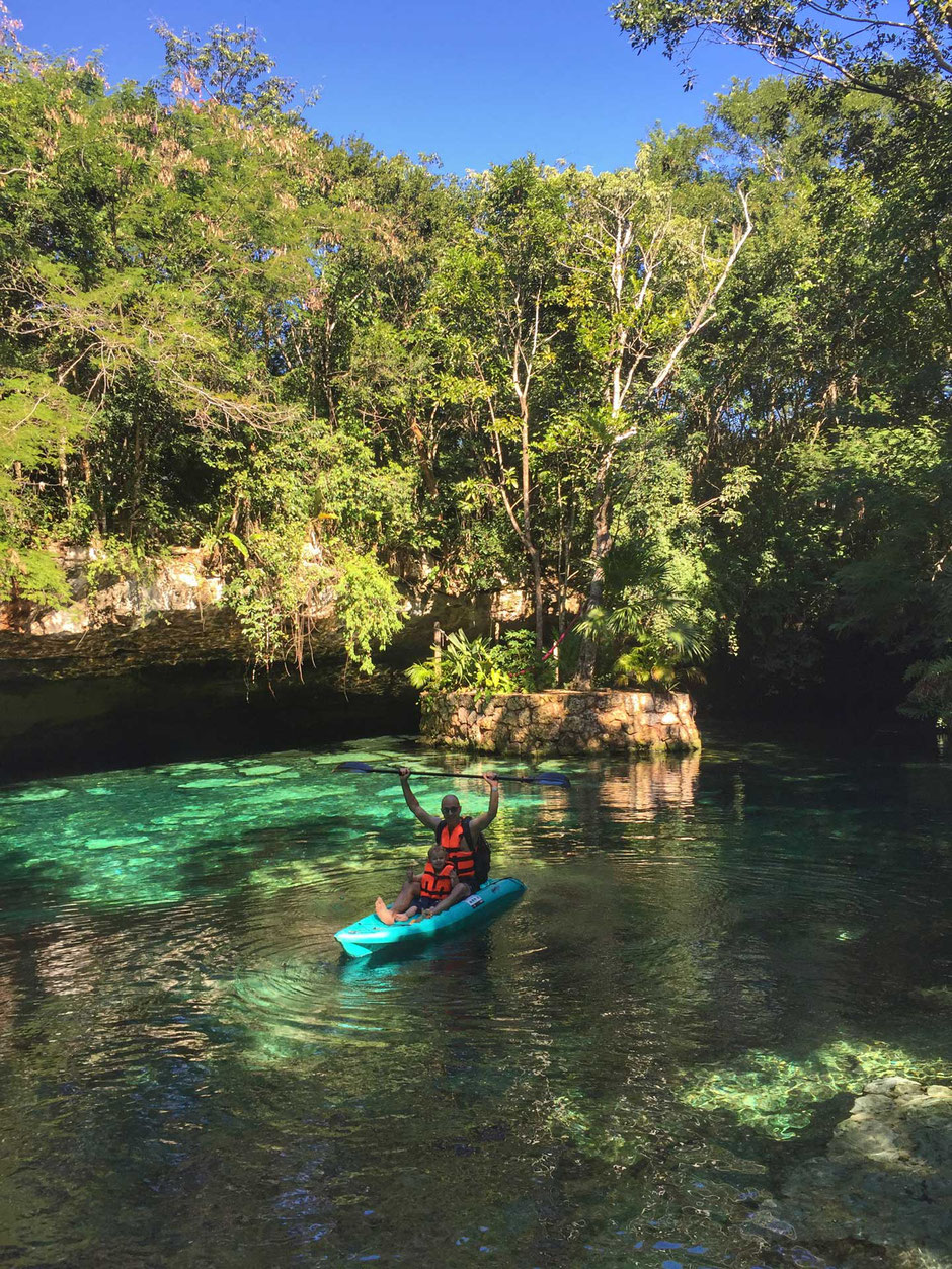 Kantun-chi ecopark cenotes in Mexico kayak with a toddler