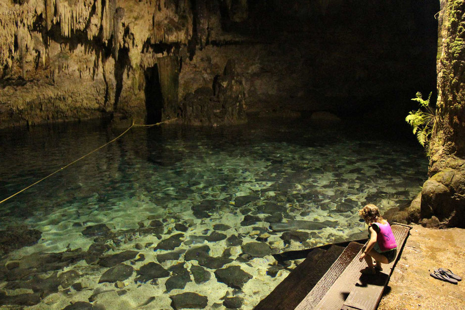 Swimming in cenote with small kids in Mexico