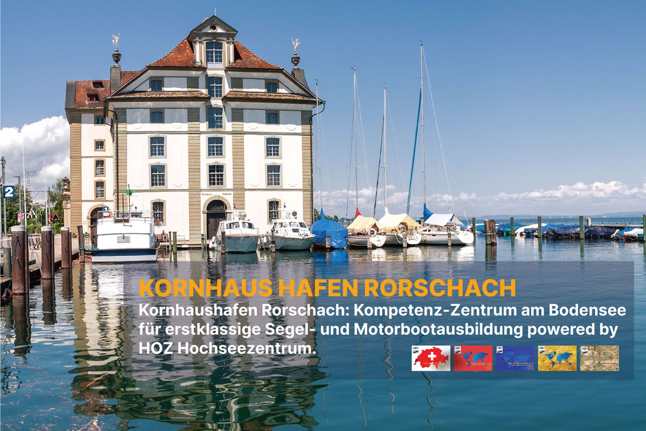 Blick auf das historische Kornhaus im Hafen Rorschach am Bodensee, umgeben von Segel- und Motorbooten, Kompetenz-Zentrum für Segel- und Motorbootausbildung des HOZ Hochseezentrums.