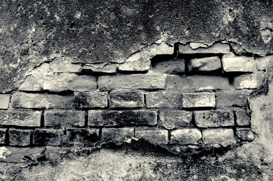 Black and white photo of an old wall