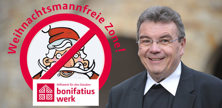 Auf der linken Seite des Fotos ist das Logo der Weihnachtsmannfreien Zone zu sehen. Ein Art Verkehrsschild, auf dem der Weihnachtsmann durchgestrichen ist. Rechts ist der Generalsekretär des Bonifatiuswerkes, Monsignore Georg Austen, abgebildet.