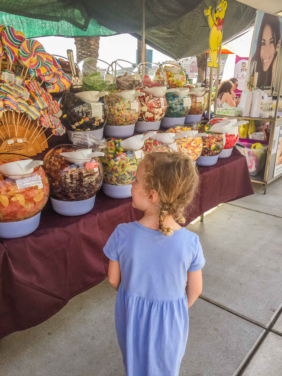 Riva market in Split Croatia with kids
