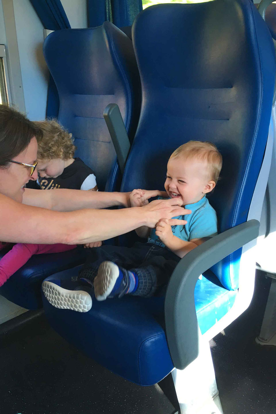 Keeping toddlers entertained on the train - Piombino to Livorno, Italy