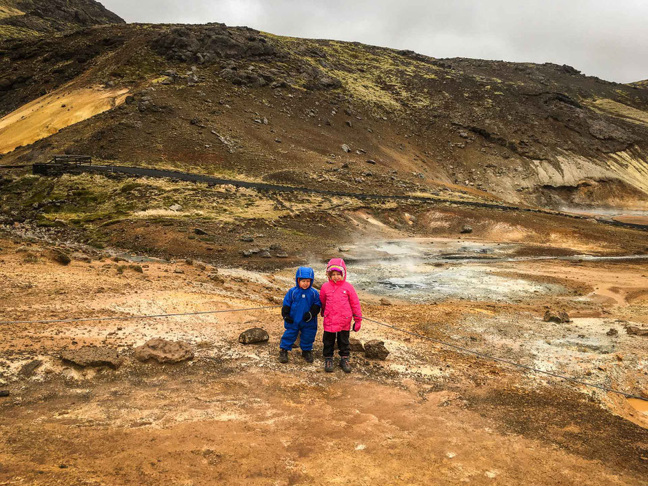 Krýsuvík geothermal field in Iceland with small kids