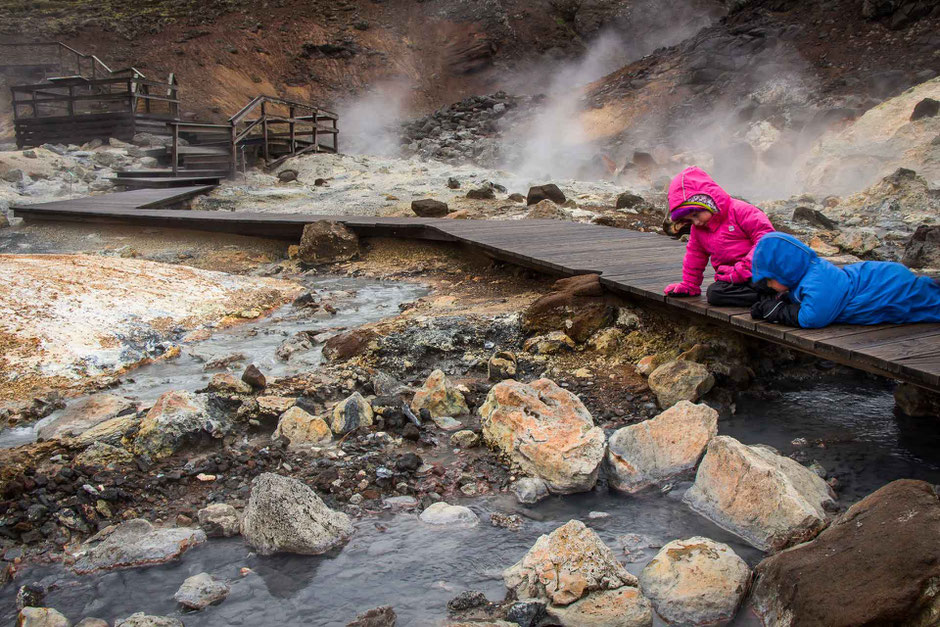 Krýsuvík geothermal field in Iceland with small kids