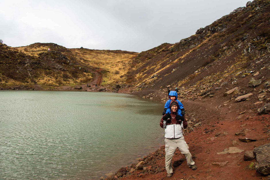 Walking the Kerid Crater lake in the Golden Circle Iceland with a toddler
