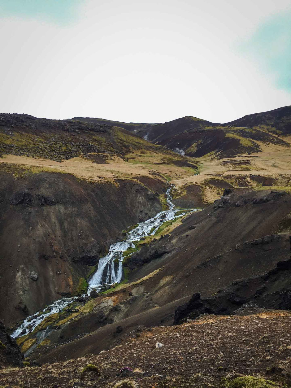 Waterfall along Hveragerði Hot Springs River Trail in Iceland