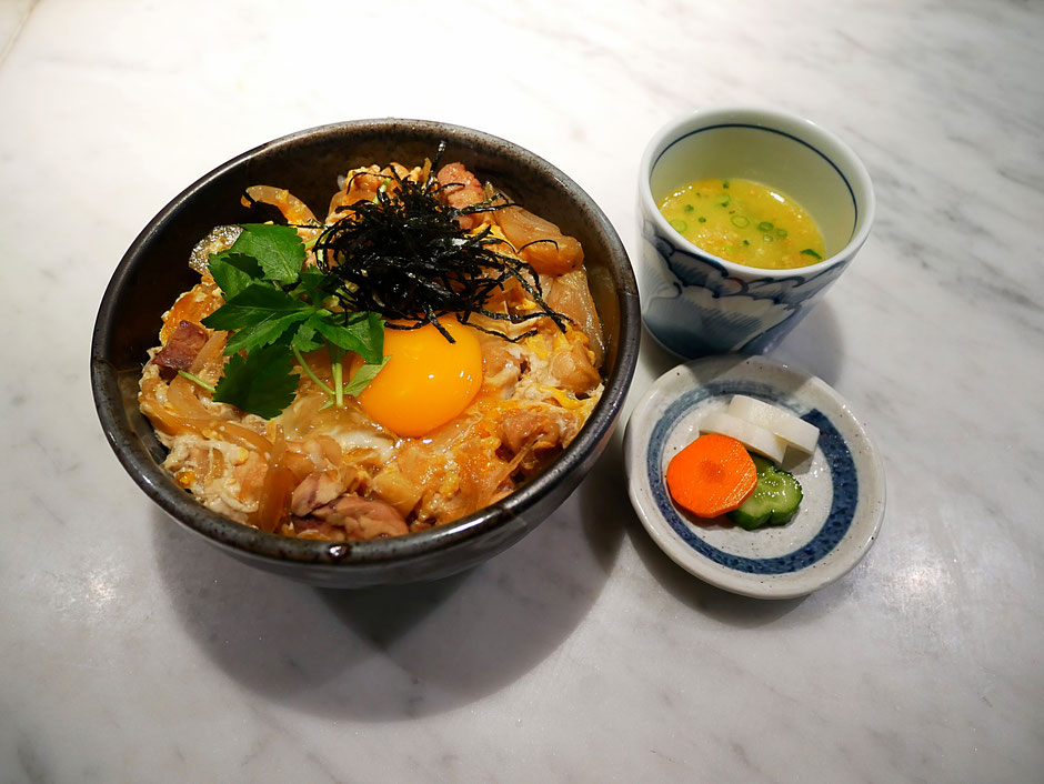 chicken donburi served with pickled vegetables and chicken broth at bincho yakitori singapore