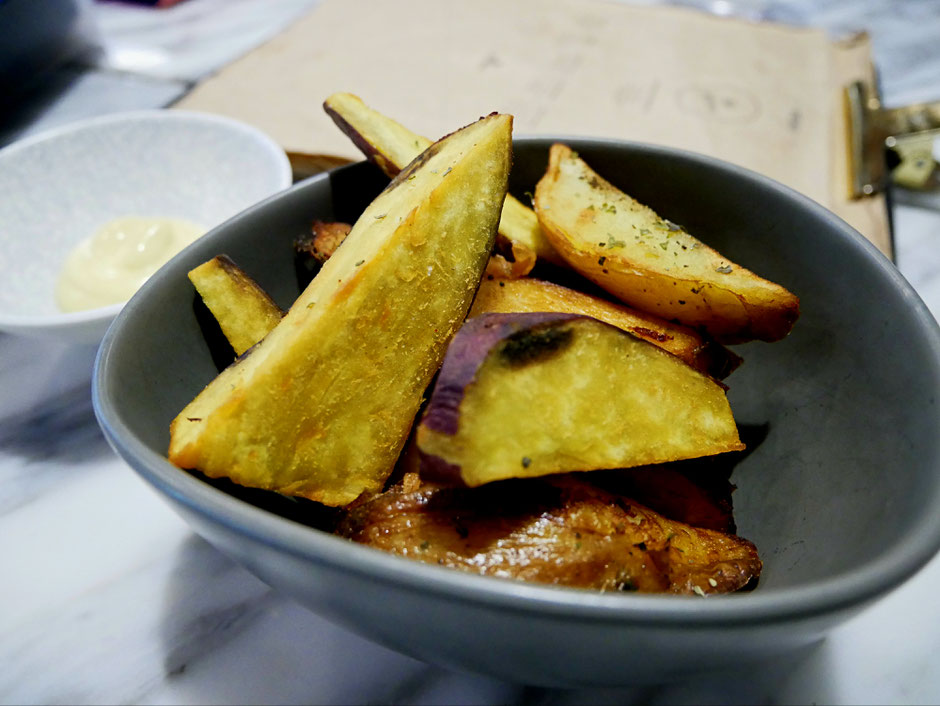 Fried organic potato and sweet potato wedges seasoned with sonnentor herbs, salt and pepper at Real Food Cafe Orchard Central