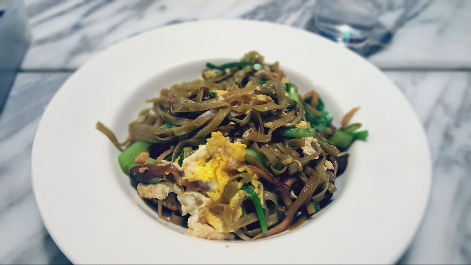 Stir fried noodles with oyster mushrooms, bak choy, beansprouts, spring onions, eggs and chilli paste at Real Food Cafe Orchard Central