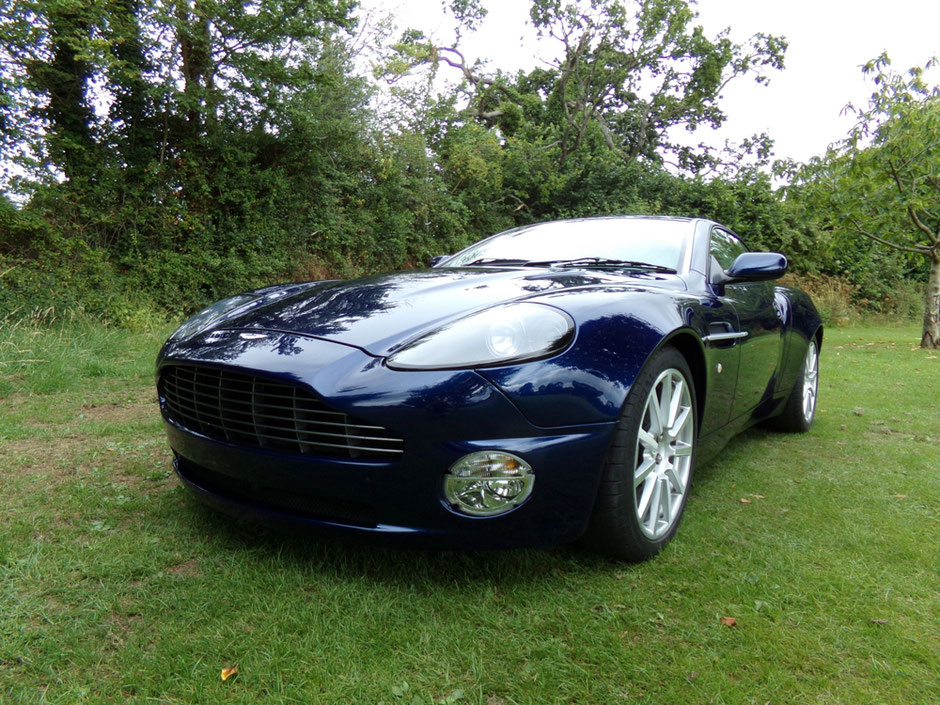 Blue Aston Martin Vanquish S after a full body respray, carried out by Parecision Paint, Wellington