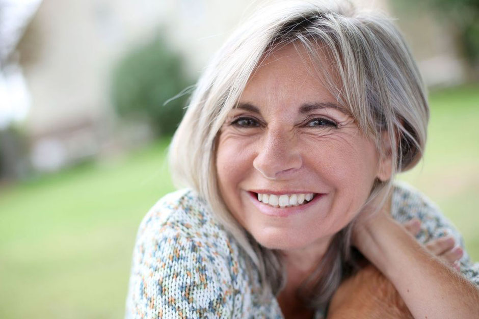 Glückliche, entspannte Frau, Foto von ESB professional on Shutterstock