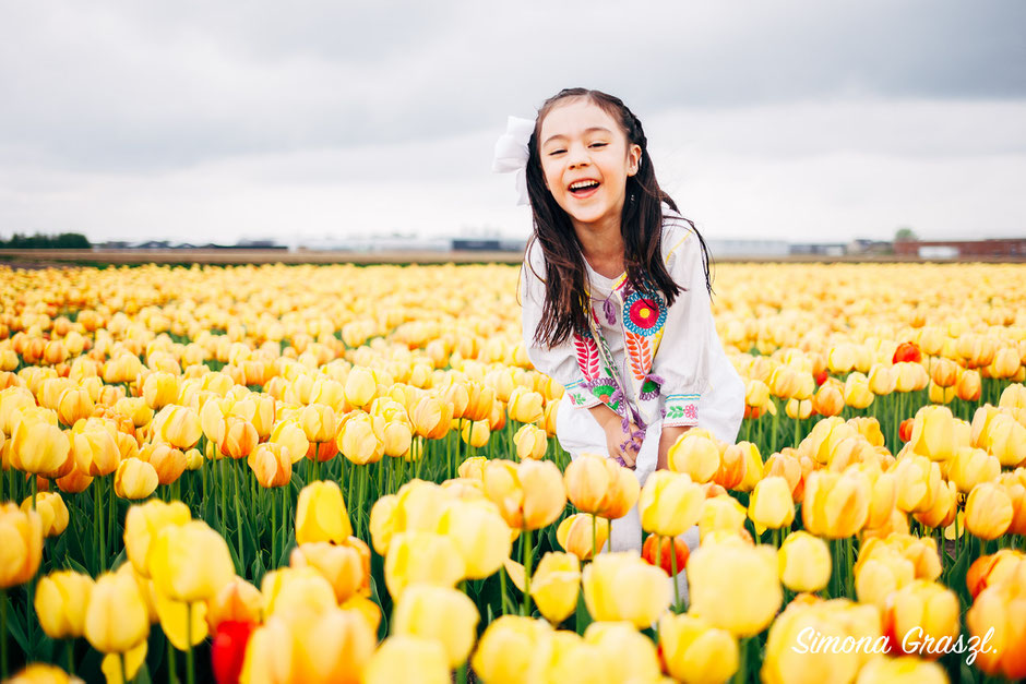 happy girl yellow flower fields