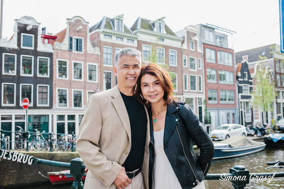 Amsterdam bridge with couple