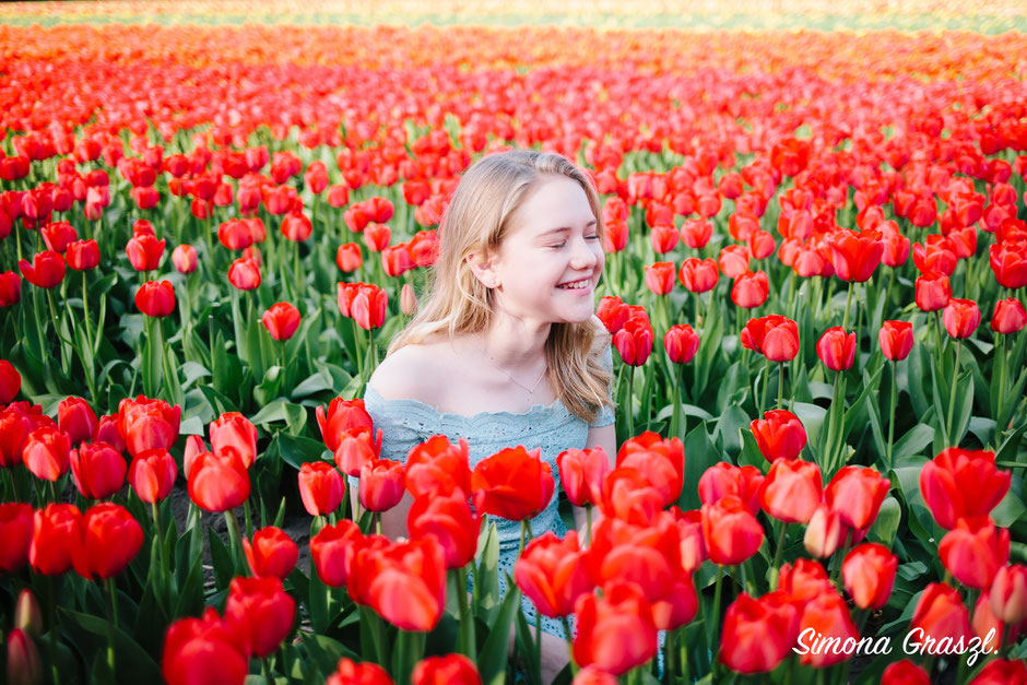 red tulips girl laughing Voorhout