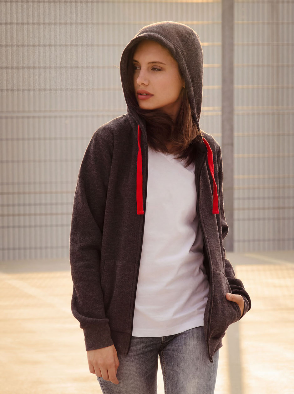 Model Katja with shirt and hoodie on the top of a parking garage in Munich