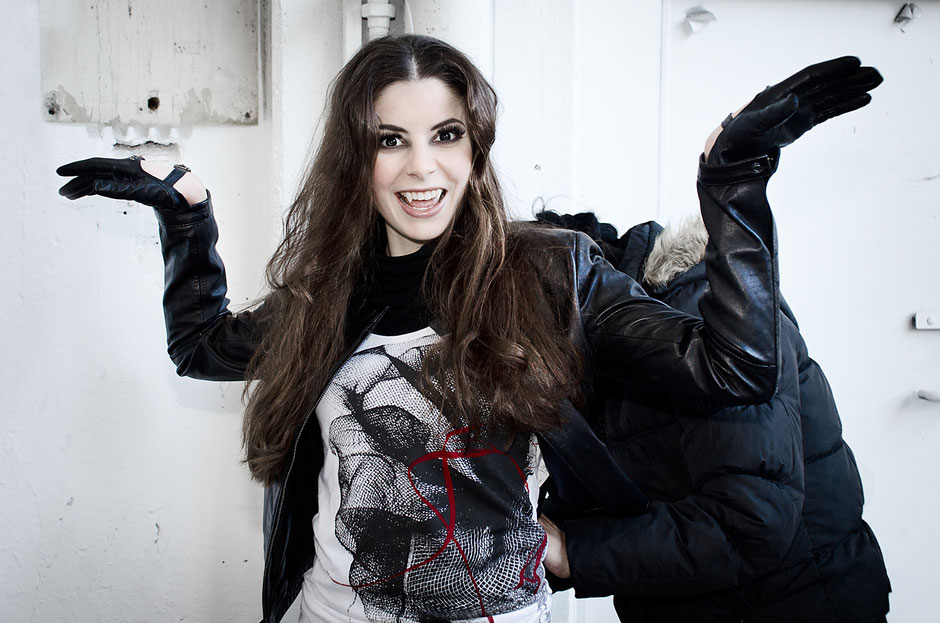 Top model and vampire is showing her dangerous teeth