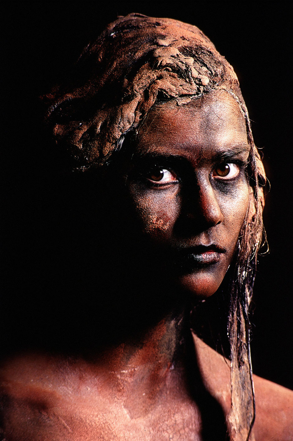 A portrait shot from a young girl with body art make up styling