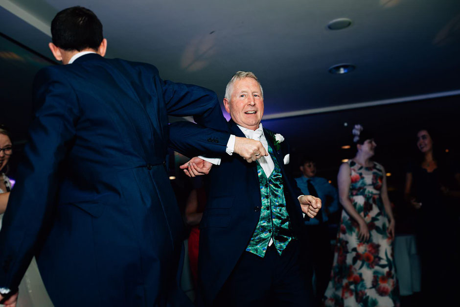 wedding guests dancing during a wedding at ribby hall
