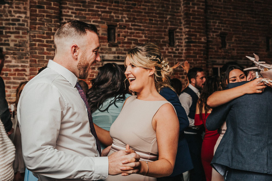 wedding guests having fun dancing