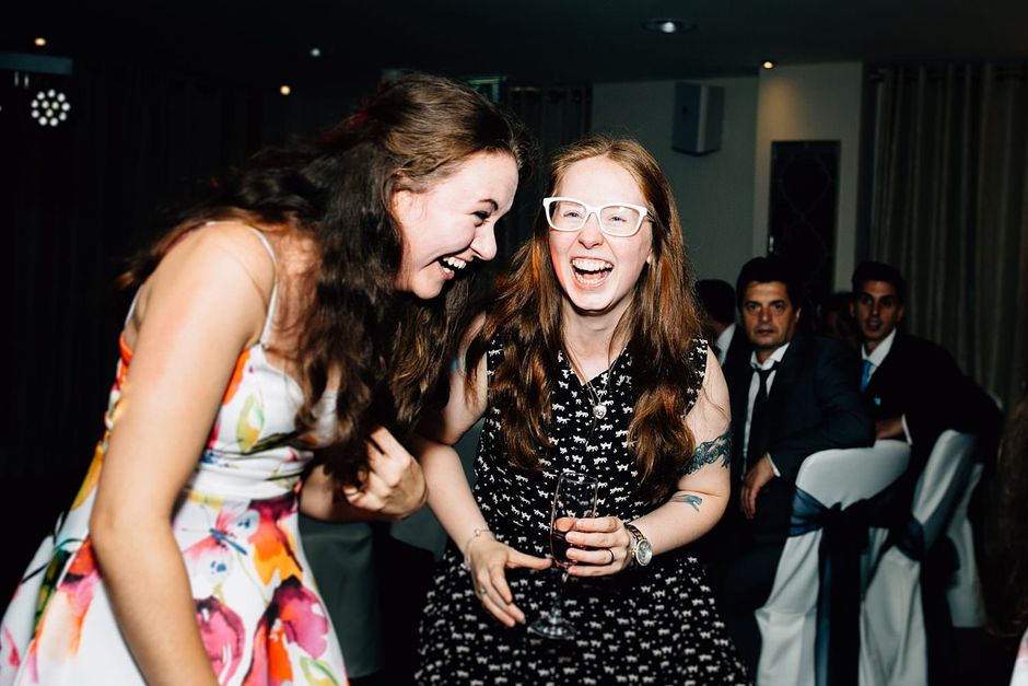 two ladies laughing