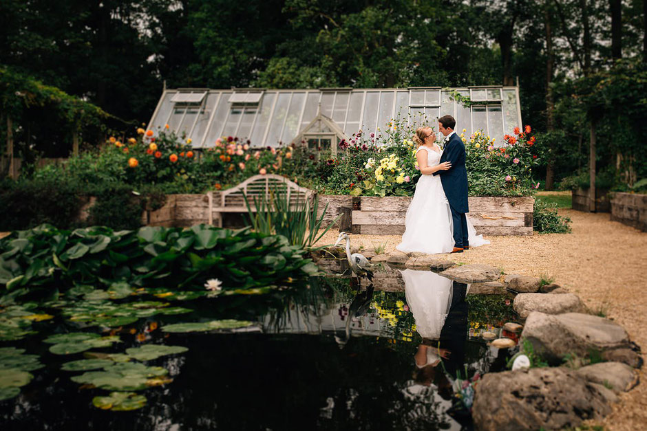 bride and groom in the gardens of ribby hall wedding venue