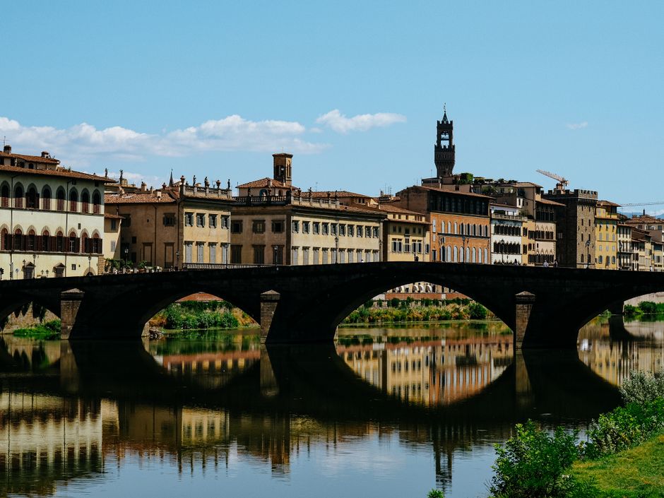 Ponte alla Carraia and its beautiful reflection on the water