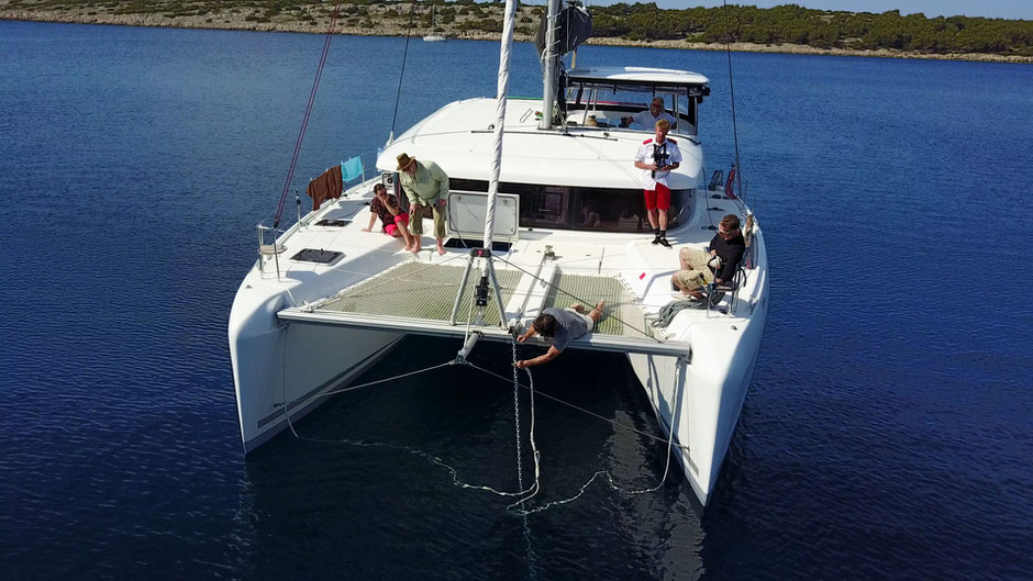 Anchor, Catamaran Skipper Training book, Catamaran Docking Training, Catamaran Lagoon 42, Catamaran Maneuer Training, Catamaran Skipper Training, Catamaran Harbor Maneuver Training, Spring leash undocking, Catamaran Docking Training, Nautical Miles