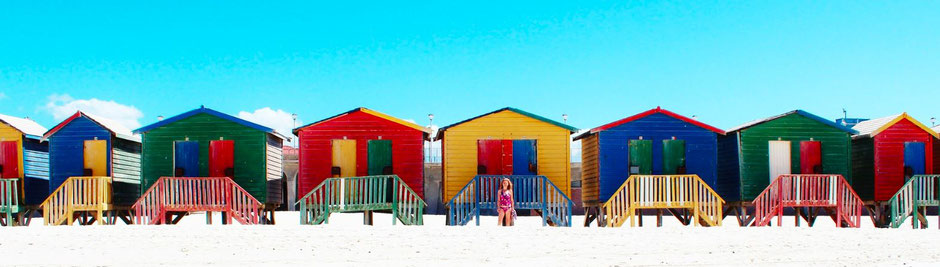 Viele unterschiedliche bunte Strandhäuser als Zeichen von Mehrwert durch Vielfalt
